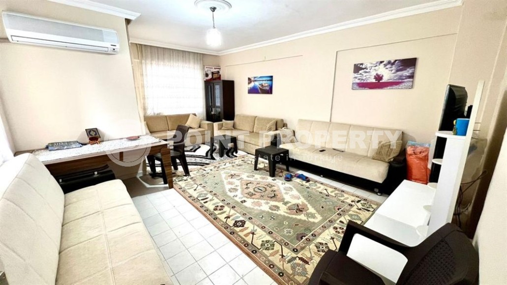 Comfortable apartment 2+1 on the 1st floor in a building built in 2002, in the center of Mahmutlar district-id-6978-photo-2