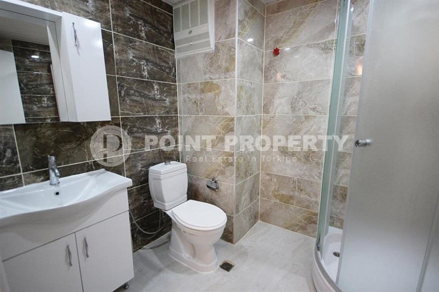 Comfortable apartment 2+1 on the 1st floor in a building built in 2002, in the center of Mahmutlar district-id-6978-photo-10