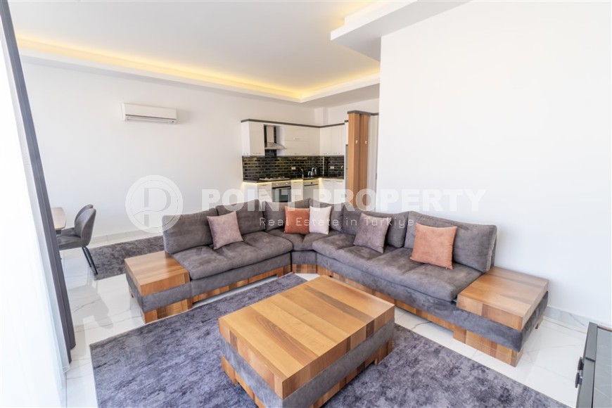 Стильная квартира с современным дизайном в комфортабельном жилом комплексе, построенном в 2020 году-id-6980-фото-2