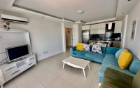 Comfortable 1+1 apartment, with a total area of 55 m2, in the modern area of Alanya - Mahmutlar Description:-id-6982-photo-1