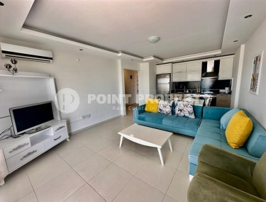 Comfortable 1+1 apartment, with a total area of 55 m2, in the modern area of Alanya - Mahmutlar Description:-id-6982-photo-1