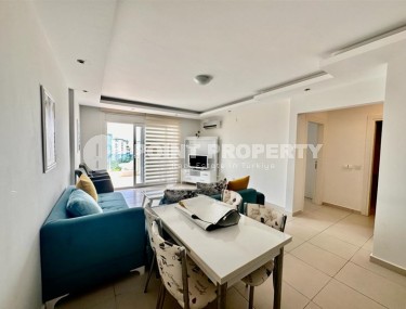 Comfortable 1+1 apartment, with a total area of 55 m2, in the modern area of Alanya - Mahmutlar Description:-id-6982-photo-2