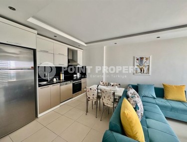 Comfortable 1+1 apartment, with a total area of 55 m2, in the modern area of Alanya - Mahmutlar Description:-id-6982-photo-3