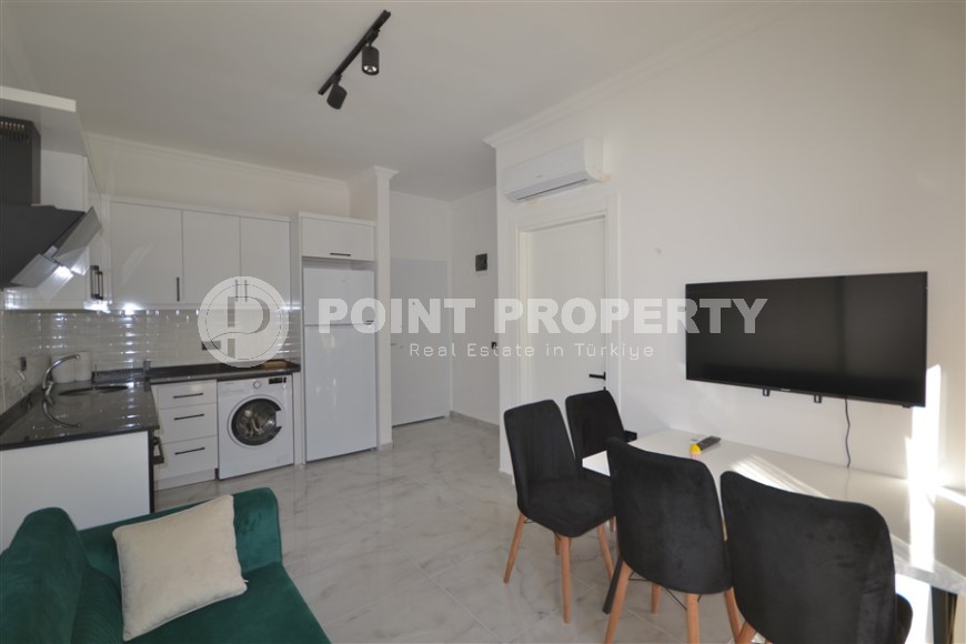 Готовая к проживанию квартира 1+1, общей площадью 50 м2, в перспективном районе Аланьи - Авсаллар-id-6994-фото-2