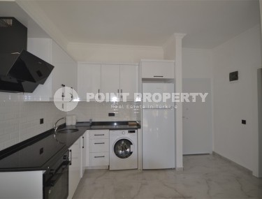 Готовая к проживанию квартира 1+1, общей площадью 50 м2, в перспективном районе Аланьи - Авсаллар-id-6994-фото-3