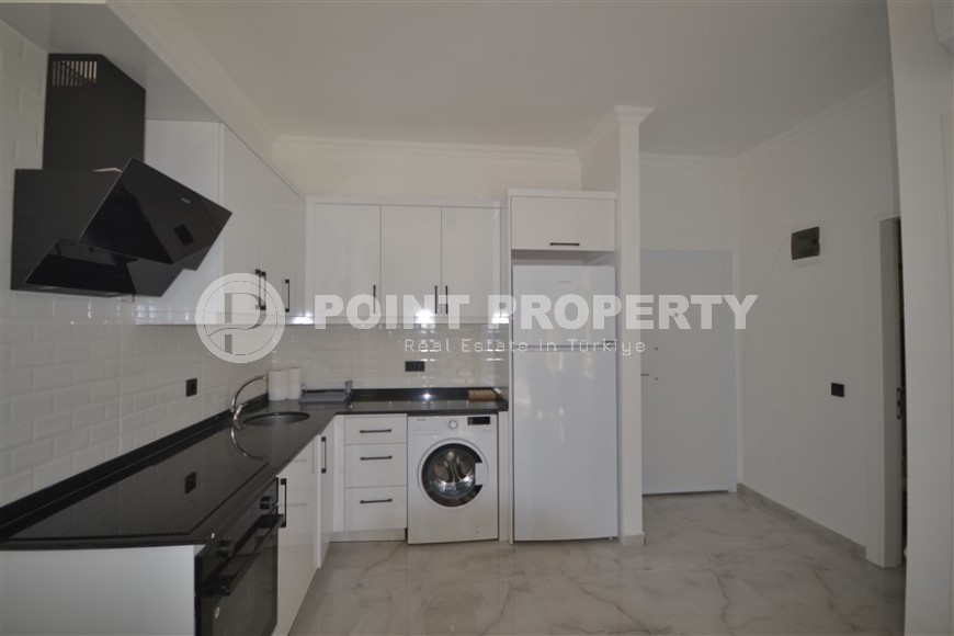 Готовая к проживанию квартира 1+1, общей площадью 50 м2, в перспективном районе Аланьи - Авсаллар-id-6994-фото-3