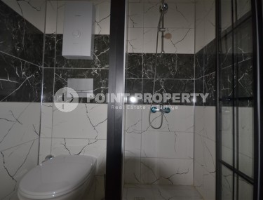 Готовая к проживанию квартира 1+1, общей площадью 50 м2, в перспективном районе Аланьи - Авсаллар-id-6994-фото-5