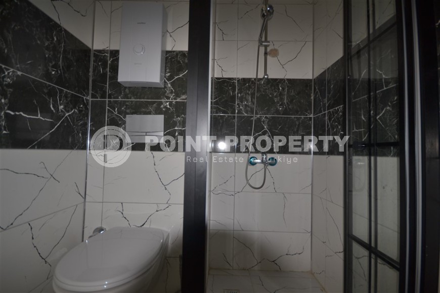 Готовая к проживанию квартира 1+1, общей площадью 50 м2, в перспективном районе Аланьи - Авсаллар-id-6994-фото-5