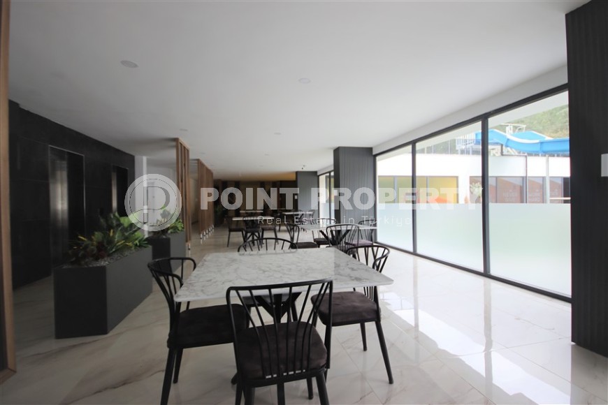 Готовая к проживанию квартира 1+1, общей площадью 50 м2, в перспективном районе Аланьи - Авсаллар-id-6994-фото-10