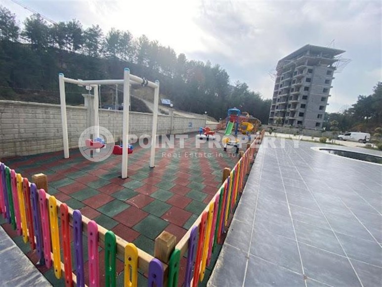 Готовая к проживанию квартира 1+1, общей площадью 50 м2, в перспективном районе Аланьи - Авсаллар-id-6994-фото-12