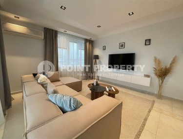 Spacious apartment with new renovation and modern design, 150 meters from the sea, in the center of the Tosmur district-id-6995-photo-1