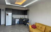 Inexpensive apartment with furniture and household appliances, 1800 meters from the sea, in the Mahmutlar area-id-6999-photo-1