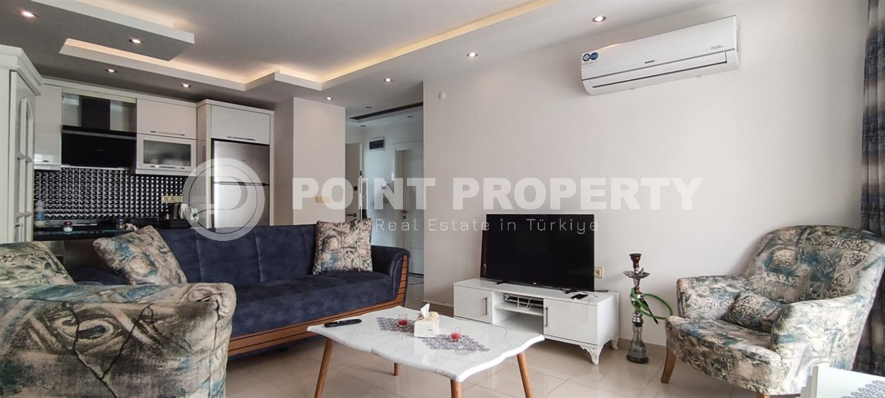 Квартира 1+1 с современным дизайном, комфортабельной мебелью и всей необходимой бытовой техникой, в 150 метрах от моря-id-7002-фото-3