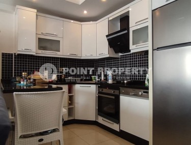 Квартира 1+1 с современным дизайном, комфортабельной мебелью и всей необходимой бытовой техникой, в 150 метрах от моря-id-7002-фото-4