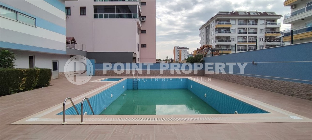 Квартира 1+1 с современным дизайном, комфортабельной мебелью и всей необходимой бытовой техникой, в 150 метрах от моря-id-7002-фото-12