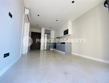 Новая квартира с высококачественной чистовой отделкой, в 150 метрах от роскошного пляжа Клеопатры-id-7009-фото-2