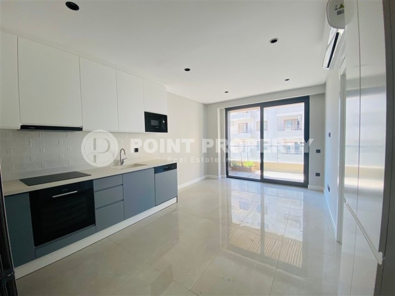 Новая квартира с высококачественной чистовой отделкой, в 150 метрах от роскошного пляжа Клеопатры-id-7009-фото-3