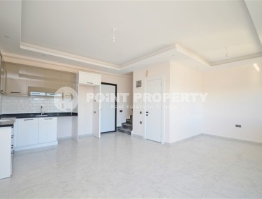 Двухуровневая квартира 2+1, общей площадью 98 м2, на 9-м этаже с мансардой, в живописном районе Аланьи - Авсаллар-id-7011-фото-2