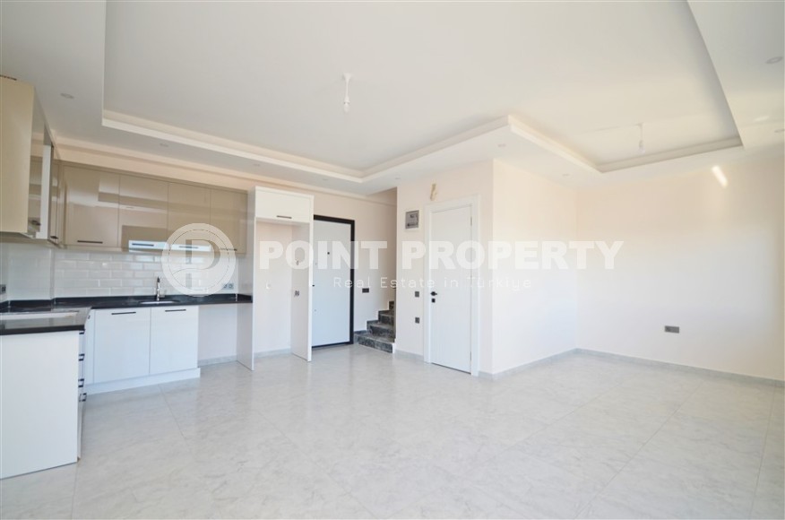 Двухуровневая квартира 2+1, общей площадью 98 м2, на 9-м этаже с мансардой, в живописном районе Аланьи - Авсаллар-id-7011-фото-2