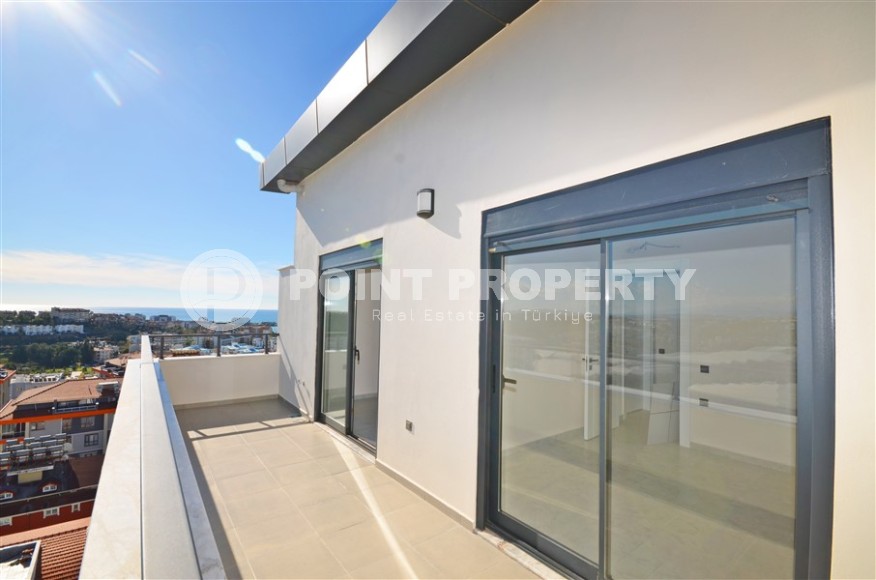 Двухуровневая квартира 2+1, общей площадью 98 м2, на 9-м этаже с мансардой, в живописном районе Аланьи - Авсаллар-id-7011-фото-12