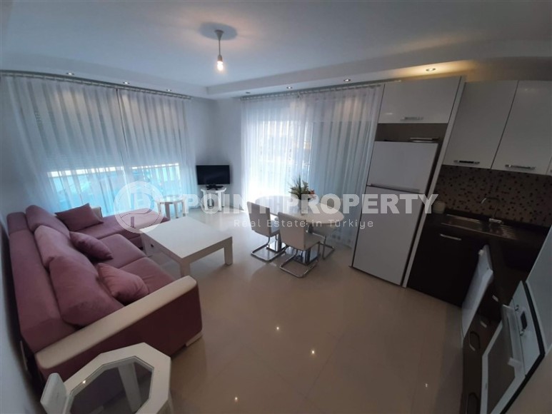 Компактная квартира с роскошной локацией в 50 метрах от знаменитого пляжа Клеопатры, в центре Аланьи-id-7014-фото-2