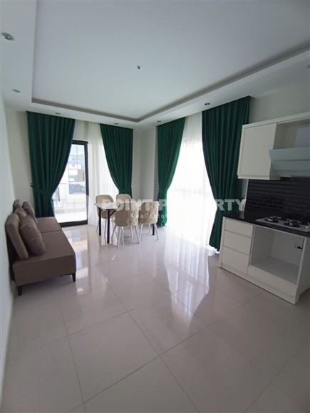 Compact comfortable apartment in a new residential complex, 850 meters from the sea-id-7026-photo-1