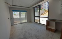 Inexpensive 1+1 apartment, with a total area of 50 m2, 800 meters from the sea, in the Mahmutlar area-id-7027-photo-3