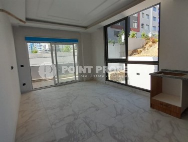 Inexpensive 1+1 apartment, with a total area of 50 m2, 800 meters from the sea, in the Mahmutlar area-id-7027-photo-3