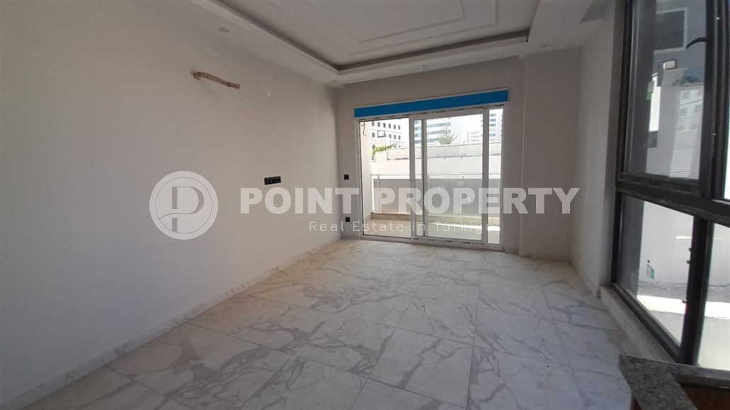 Inexpensive 1+1 apartment, with a total area of 50 m2, 800 meters from the sea, in the Mahmutlar area-id-7027-photo-4