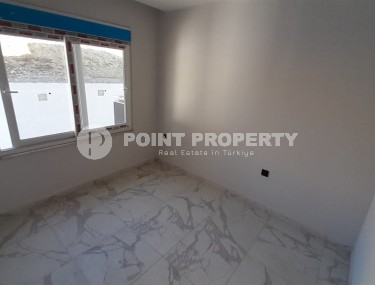 Inexpensive 1+1 apartment, with a total area of 50 m2, 800 meters from the sea, in the Mahmutlar area-id-7027-photo-5