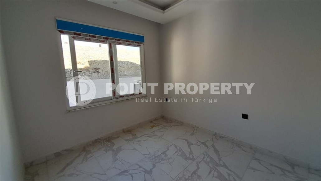 Inexpensive 1+1 apartment, with a total area of 50 m2, 800 meters from the sea, in the Mahmutlar area-id-7027-photo-6