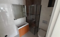 Inexpensive 1+1 apartment, with a total area of 50 m2, 800 meters from the sea, in the Mahmutlar area-id-7027-photo-7