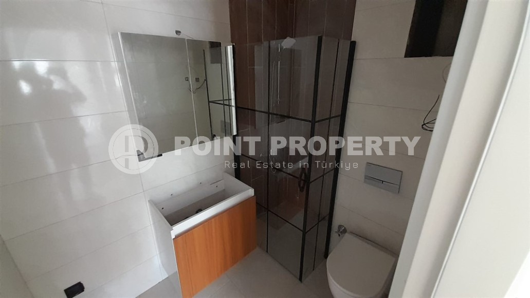 Inexpensive 1+1 apartment, with a total area of 50 m2, 800 meters from the sea, in the Mahmutlar area-id-7027-photo-7