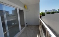 Inexpensive 1+1 apartment, with a total area of 50 m2, 800 meters from the sea, in the Mahmutlar area-id-7027-photo-8