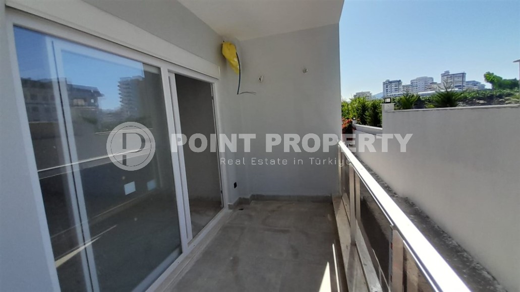 Inexpensive 1+1 apartment, with a total area of 50 m2, 800 meters from the sea, in the Mahmutlar area-id-7027-photo-8