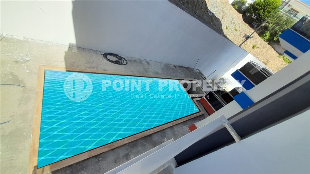 Inexpensive 1+1 apartment, with a total area of 50 m2, 800 meters from the sea, in the Mahmutlar area-id-7027-photo-10