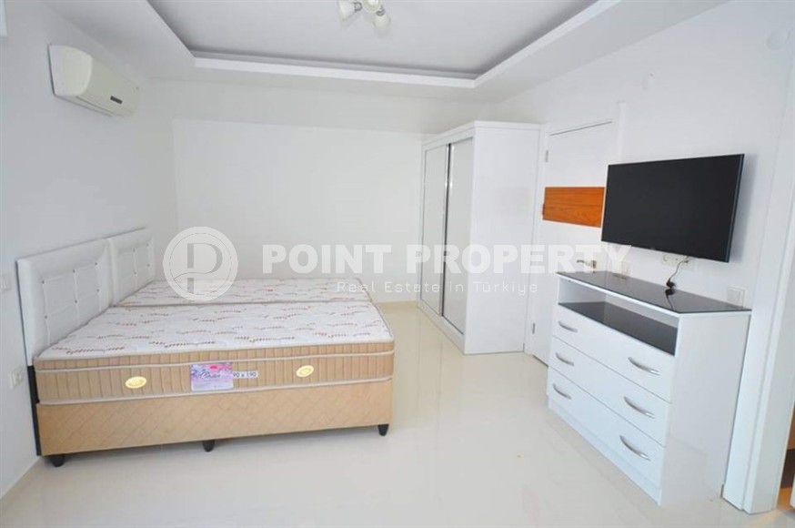 Просторная двухуровневая квартира с тремя спальными комнатами, на 5-м этаже с мансардой, в центре Аланьи-id-7028-фото-5