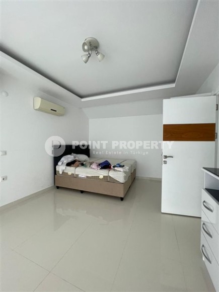 Просторная двухуровневая квартира с тремя спальными комнатами, на 5-м этаже с мансардой, в центре Аланьи-id-7028-фото-6