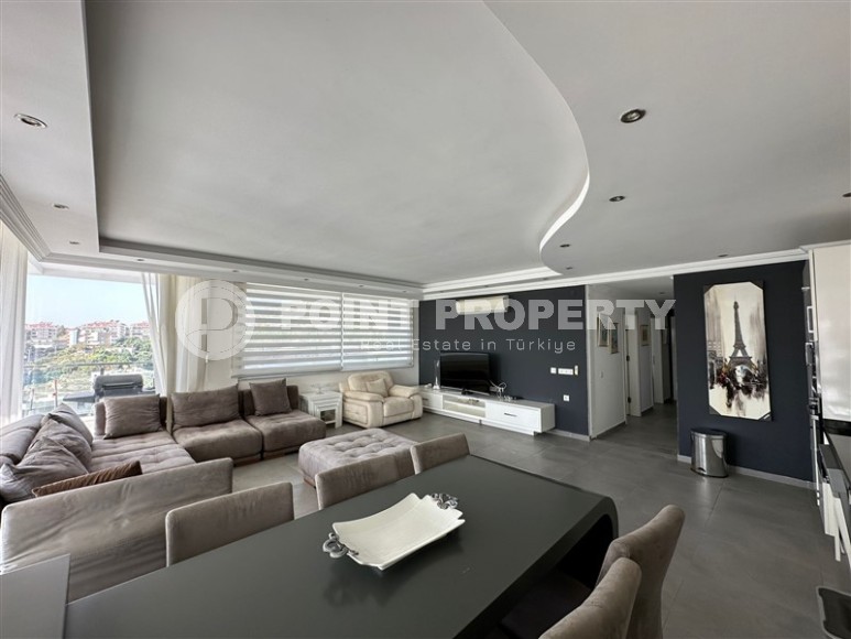 Современная квартира с тремя спальнями и большой открытой террасой, площадью 125 м2, в спокойном районе Аланьи - Джикджилли-id-7030-фото-2