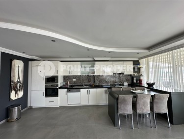 Современная квартира с тремя спальнями и большой открытой террасой, площадью 125 м2, в спокойном районе Аланьи - Джикджилли-id-7030-фото-3