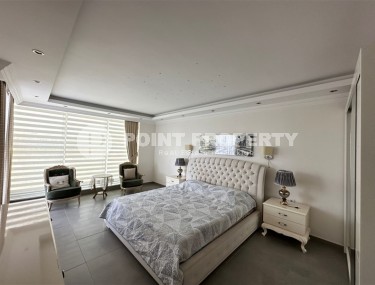 Современная квартира с тремя спальнями и большой открытой террасой, площадью 125 м2, в спокойном районе Аланьи - Джикджилли-id-7030-фото-4