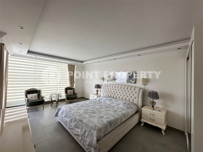 Современная квартира с тремя спальнями и большой открытой террасой, площадью 125 м2, в спокойном районе Аланьи - Джикджилли-id-7030-фото-4