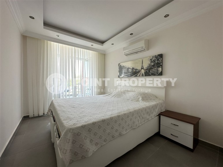 Современная квартира с тремя спальнями и большой открытой террасой, площадью 125 м2, в спокойном районе Аланьи - Джикджилли-id-7030-фото-6