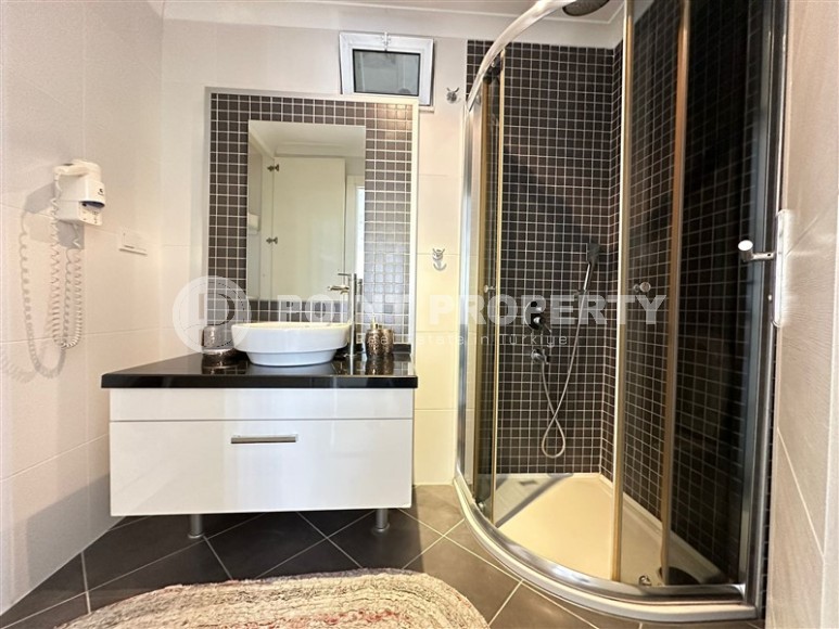 Современная квартира с тремя спальнями и большой открытой террасой, площадью 125 м2, в спокойном районе Аланьи - Джикджилли-id-7030-фото-7