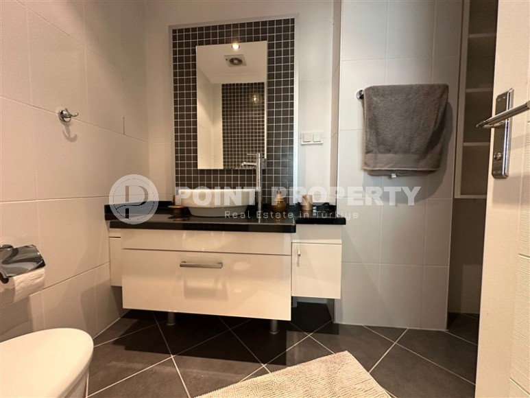 Современная квартира с тремя спальнями и большой открытой террасой, площадью 125 м2, в спокойном районе Аланьи - Джикджилли-id-7030-фото-8