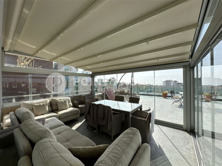 Современная квартира с тремя спальнями и большой открытой террасой, площадью 125 м2, в спокойном районе Аланьи - Джикджилли-id-7030-фото-9