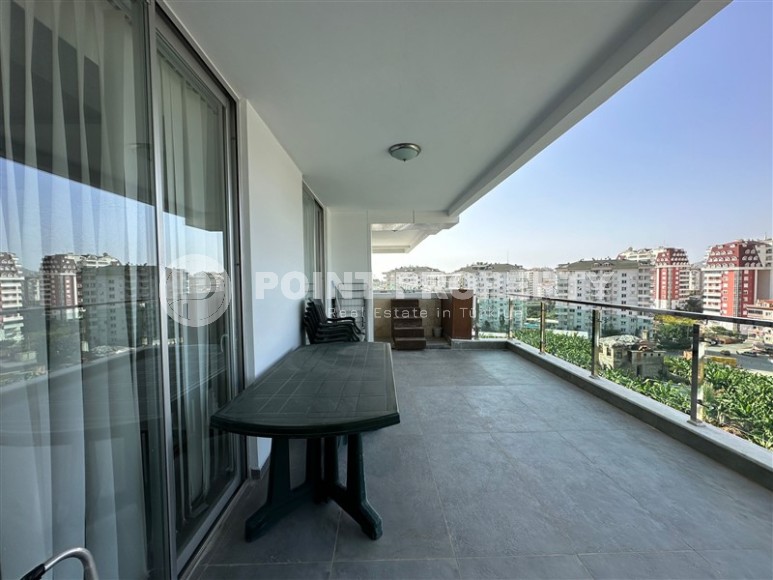 Современная квартира с тремя спальнями и большой открытой террасой, площадью 125 м2, в спокойном районе Аланьи - Джикджилли-id-7030-фото-10