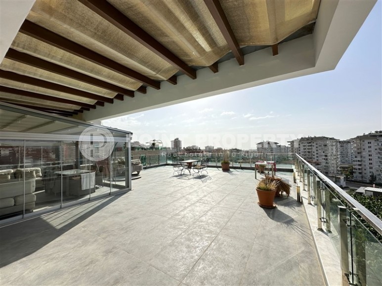 Современная квартира с тремя спальнями и большой открытой террасой, площадью 125 м2, в спокойном районе Аланьи - Джикджилли-id-7030-фото-12