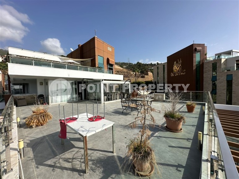 Современная квартира с тремя спальнями и большой открытой террасой, площадью 125 м2, в спокойном районе Аланьи - Джикджилли-id-7030-фото-13