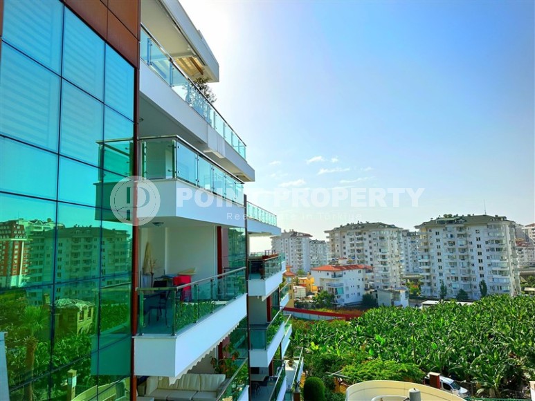 Современная квартира с тремя спальнями и большой открытой террасой, площадью 125 м2, в спокойном районе Аланьи - Джикджилли-id-7030-фото-17